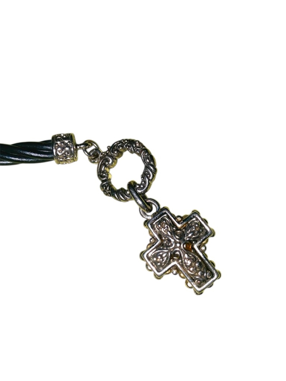 Silver-toned cross pendant paired with a cord bracelet featuring a toggle clasp - Picture 2 of 3